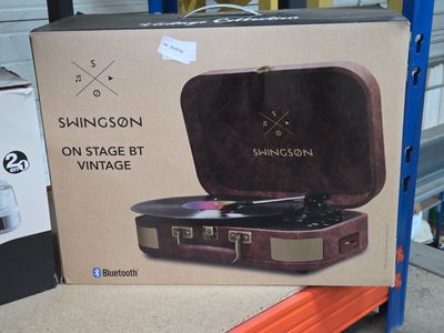 une boîte en carton contenant un tourne-disque