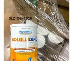 someone is holding a can of bouil dine in their hand