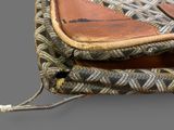 a purse that has a zipper on the inside of it
