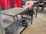 a table with a basket on top of it in a warehouse