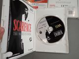 a dvd in a white case with a picture of scarface on it