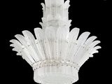 a chandelier made out of white plastic flowers
