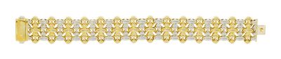 a close up of a gold and white bracelet on a white background