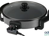 an electric skillet with a lid on a white background