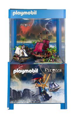 deux boîtes Playmobil contenant chacune un bateau pirate