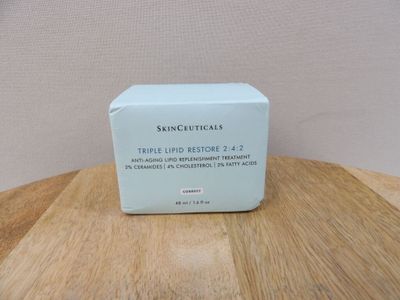 a box of skinceuticals on a wooden table