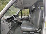 the interior of a van with the driver ' s seat up