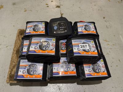 a lot of different types of tires on the floor