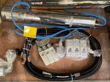 a box with a bunch of wires and other items in it