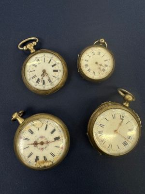 three antique pocket watches with roman numerals and roman numerals on them