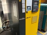 an image of a yellow and black machine in a warehouse