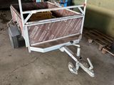 a cart that is sitting in the middle of a garage
