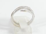 a close up of a ring on a stand with a white background