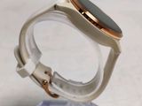 a smart watch sitting on top of a clear case