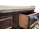a wooden desk with a drawer on top of it