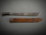two knives that are sitting next to each other on a table