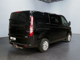 an image of a black van parked in a garage