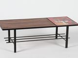 the table is made of wood and metal with a tile top