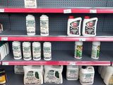 many bottles of cleaning products on the shelves in the store