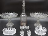 a lot of glass items that are on a table