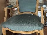 a chair that is sitting in the corner of a room