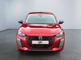 the front view of a red car in a white room