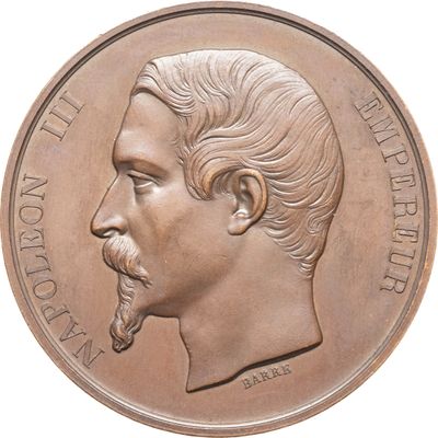 une image représentant une médaille de bronze sur laquelle figure le visage d'un homme