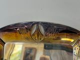 a mirror that is sitting on a table