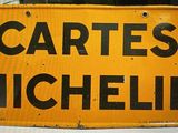 a yellow sign that says cartes michelin on it
