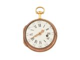 une montre de poche en or avec des chiffres romains sur le cadran