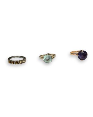 three rings and a ring on a white background