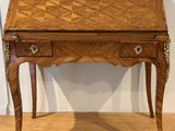 an image of a desk with a drawer on top of it on a hard wood floor