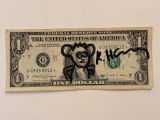 a one dollar bill with a drawing of a woman on it
