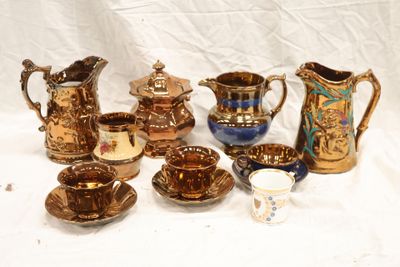 many different types of coffee cups and saucers on the table