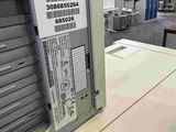 a label on the side of a machine in a factory