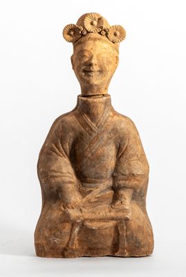 an image of a statue of a woman with a goat head on her head