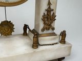 a clock that is sitting on top of a table