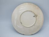 an image of a white plate sitting on top of a table