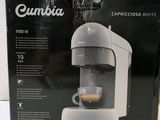 the box of the coffee machine is open on the table
