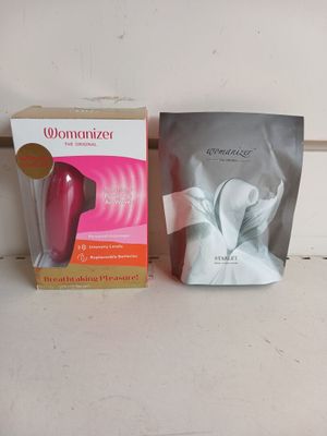 packaging of a hair dryer and a hair brush on a counter