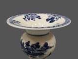 a blue and white vase with a blue and white design on it