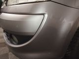a close up of the front bumper of a car