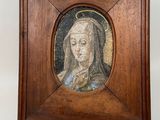 an image of a framed picture of a woman with a crown on her head