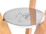 a small table with a glass top on a wooden table