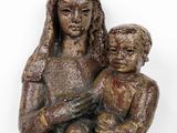 an image of a statue of a woman holding a child