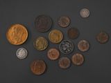 a lot of coins that are on the table