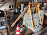 an image of a pile of construction materials in a garage
