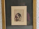 framed picture of a man and a woman sitting on a couch