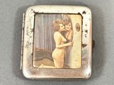 a picture of a woman holding a mirror in her hand
