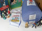 a box of toys and a bag of toys on a table